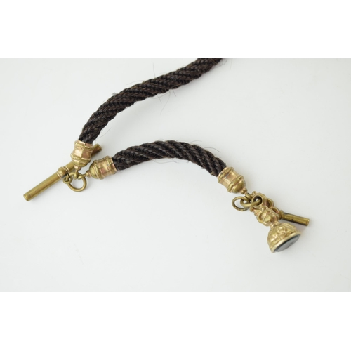 215 - Early Victorian mourning albert watch chain made with finely plaited hair and metal mounts, with wat... 