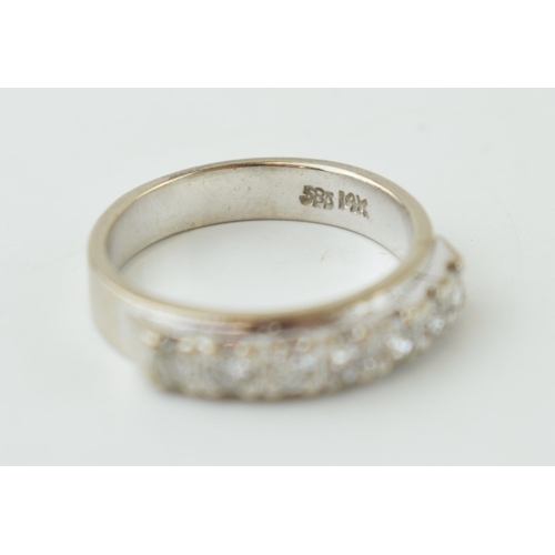 226 - 14k white gold ring, stamped 585/14k, set with white stones, 5.2g, size N/O.