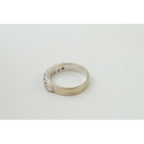 226 - 14k white gold ring, stamped 585/14k, set with white stones, 5.2g, size N/O.