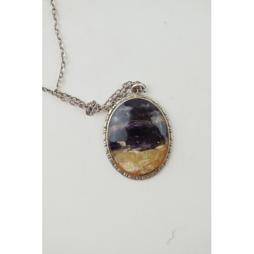 236 - Silver and Blue John pendant, rich veins, good colour, on a silver chain, length 43cm, 30mm tall.