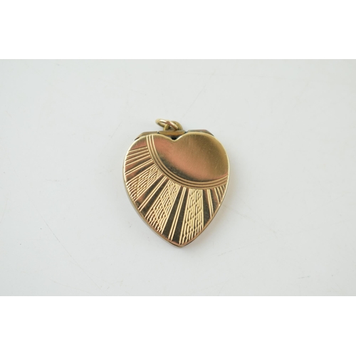 250 - 9ct yellow gold (front and back) heart shaped locket. Gross weight 3.1 grams.