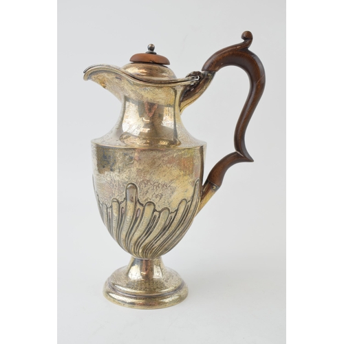 268 - Hallmarked silver water jug, with ribbed swirling decoration, wooden handle, Birmingham 1901, 21cm t... 