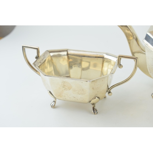 270 - Hallmarked silver three-piece tea service to include a teapot, a sugar bowl and a milk jug, Sheffiel... 