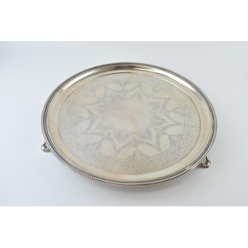 274 - Victorian hallmarked silver circular salver, Exeter 1875, bead edge, raised on three feet, engraved ... 