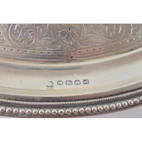 274 - Victorian hallmarked silver circular salver, Exeter 1875, bead edge, raised on three feet, engraved ... 