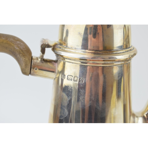 278 - Hallmarked silver coffee pot with a matching silver hot water jug, both with wooden handles and fini... 