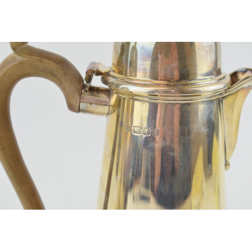 278 - Hallmarked silver coffee pot with a matching silver hot water jug, both with wooden handles and fini... 