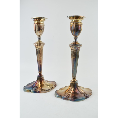 282 - A pair of large silver candlestick, shaped weighted bases, ribbed design, 30.5cm tall (2), Sheffield... 