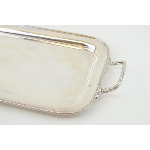 286 - Hallmarked silver rectangular tray with two handles, textured edges, foliate scroll handle, Chester ... 