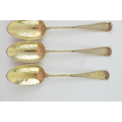 291 - A set of six Victorian silver gilt dessert spoons, with engraved decoration, ornate bowls, four are ... 