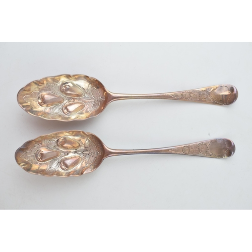 292 - A pair of Georgian silver fruit spoons, ornate handles, embossed bowls, 20cm long, hallmarks rubbed,... 