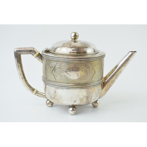 295 - Victorian silver teapot, ivory space heaters, engraved decoration, London 1883, 410.0g. Ivory submis... 