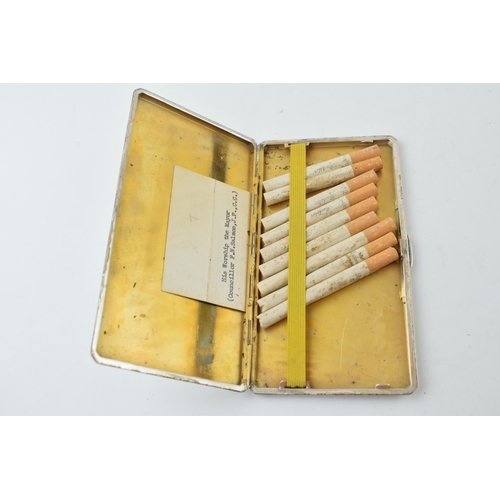 297 - Hallmarked silver cigarette case, gilt interior, engineered design, complete with strap, 245.7g, plu... 