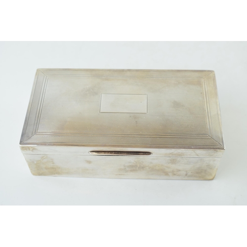 298 - Large silver cigarette box, wooden interior, engineered design, vacant cartouche, 16.5cm x 9cm, comp... 