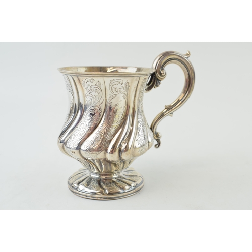 299 - Georgian silver tankard, ribbed design with floral engraving, ornate base and handle, marks rubbed b... 