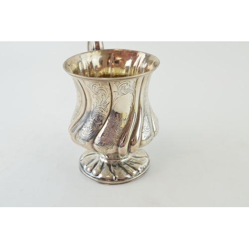 299 - Georgian silver tankard, ribbed design with floral engraving, ornate base and handle, marks rubbed b... 