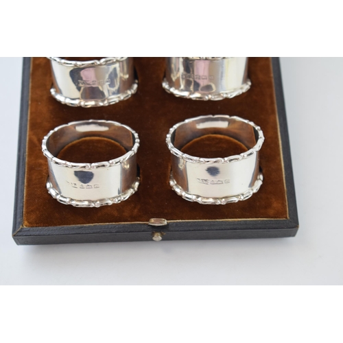 322 - A set of cased 'Walker & Hall Sheffield' silver napkin rings. Hallmarked Birmingham 1938. Weight 76 ... 