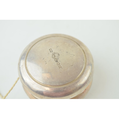 329 - Novelty silver yoyo hallmarked London 2001. Gross weight 76.6 grams.