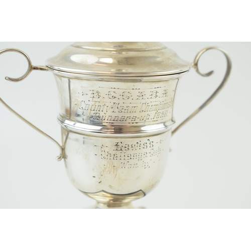 331 - Silver lidded cup on plinth 'County Team Championship 1928' Hallmarked Sheffield 1928. Weight 119.3 ... 