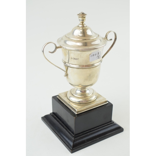 331 - Silver lidded cup on plinth 'County Team Championship 1928' Hallmarked Sheffield 1928. Weight 119.3 ... 