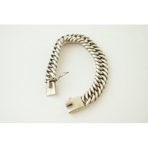 345 - Silver bracelet with heavy clasp and safety catch.  Weight 54 grams.