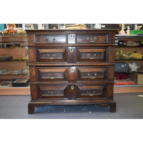 37 - Early c18th Oak Chest of Four Long Drawers with Raised Fielded Panels original Brass Handles & Escut... 