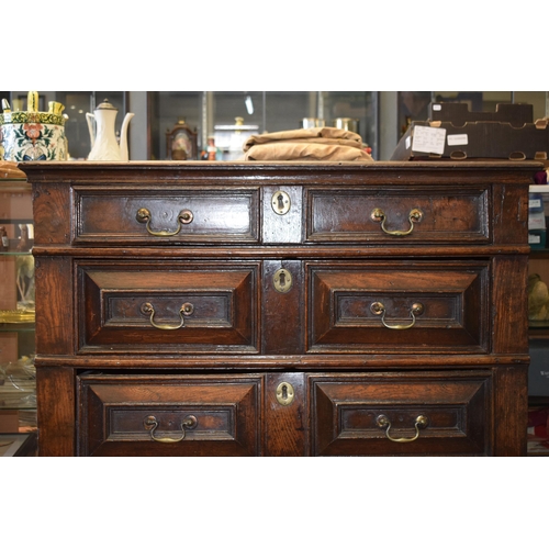 37 - Early c18th Oak Chest of Four Long Drawers with Raised Fielded Panels original Brass Handles & Escut... 