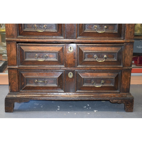 37 - Early c18th Oak Chest of Four Long Drawers with Raised Fielded Panels original Brass Handles & Escut... 