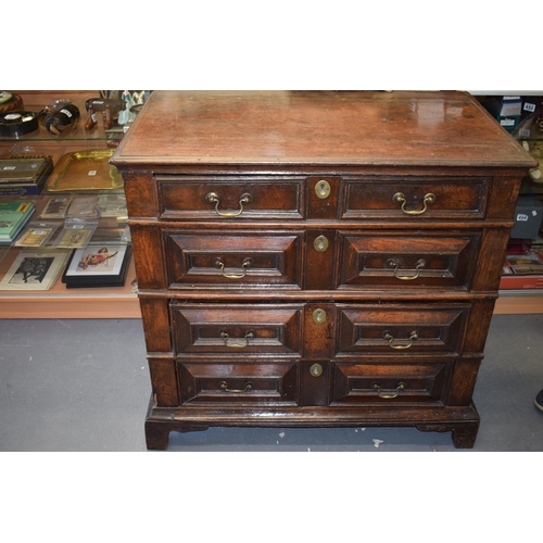 37 - Early c18th Oak Chest of Four Long Drawers with Raised Fielded Panels original Brass Handles & Escut... 