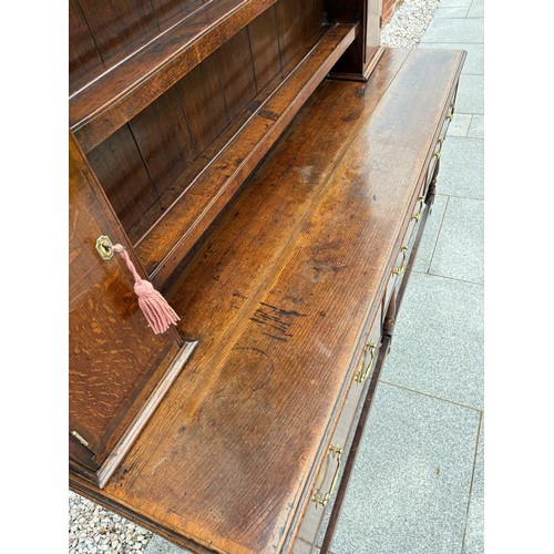 35 - 18th century oak dresser, brass fixtures and fittings, with plate rack, later plank backing, 186cm w... 