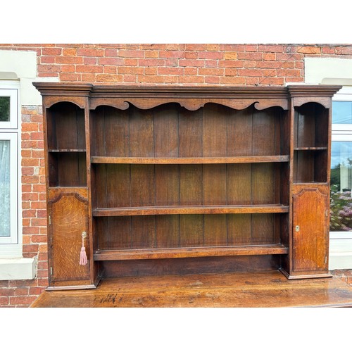 35 - 18th century oak dresser, brass fixtures and fittings, with plate rack, later plank backing, 186cm w... 