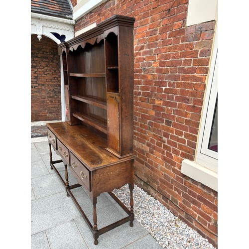 35 - 18th century oak dresser, brass fixtures and fittings, with plate rack, later plank backing, 186cm w... 