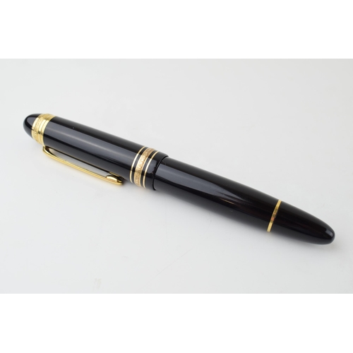 204 - Montblanc Anniversary 149 Fountain Pen in black with two broad and two narrow gold bands, upper cap ... 