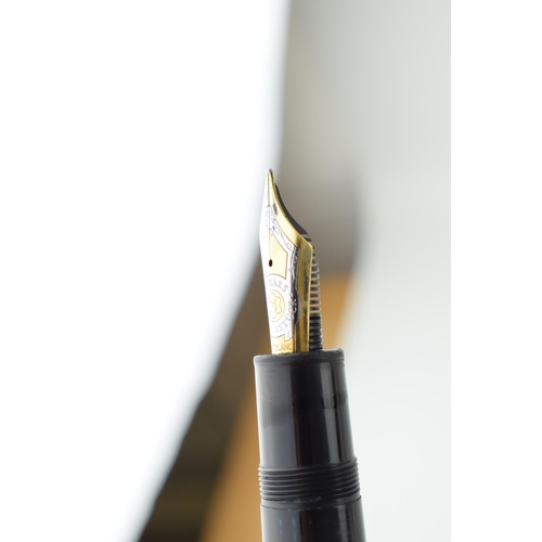 204 - Montblanc Anniversary 149 Fountain Pen in black with two broad and two narrow gold bands, upper cap ... 