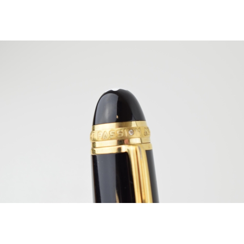 204 - Montblanc Anniversary 149 Fountain Pen in black with two broad and two narrow gold bands, upper cap ... 