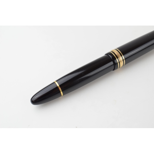 204 - Montblanc Anniversary 149 Fountain Pen in black with two broad and two narrow gold bands, upper cap ... 