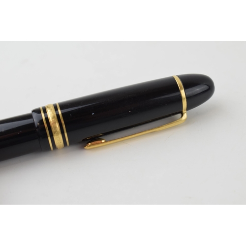 205 - Montblanc Meisterstuck 149 Fountain Pen in black with one broad and two narrow gold bands, 18ct bi-c... 