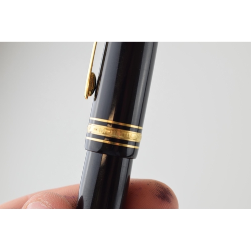 205 - Montblanc Meisterstuck 149 Fountain Pen in black with one broad and two narrow gold bands, 18ct bi-c... 