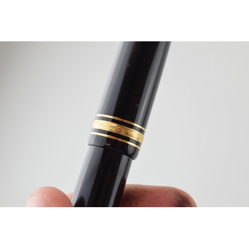 205 - Montblanc Meisterstuck 149 Fountain Pen in black with one broad and two narrow gold bands, 18ct bi-c... 