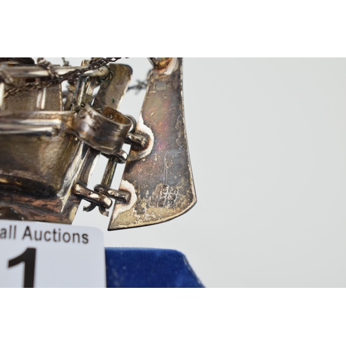 21 - A silver model of a sail boat with anchor. Marked .925. Height 13cm. Weight 62 grams.