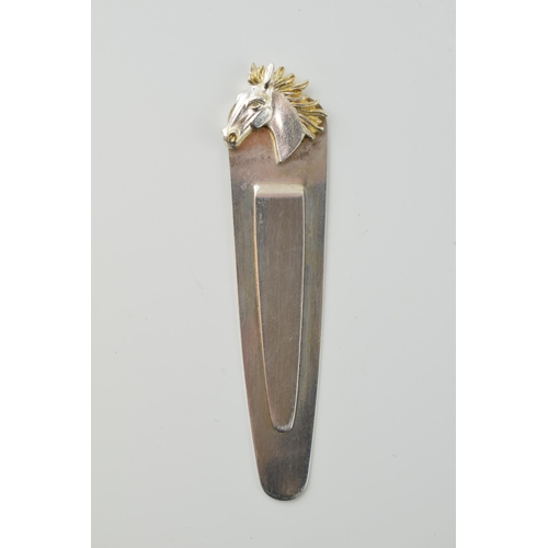 22 - A silver bookmark with horses head design. 7cm. Weight 6.6 grams.