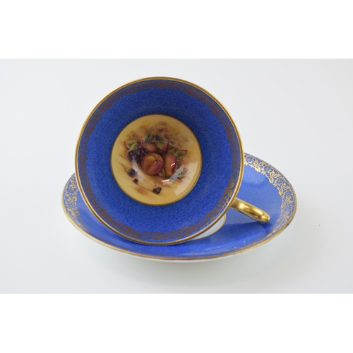 4 - Aynsley cup and saucer, Orchard Gold design with blue surround and gilt decoration. Height 7cm.