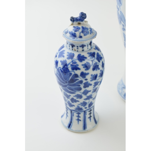 5 - Oriental items to include two blue and white vases together with a lacquer work lidded pot. (3) Heig... 