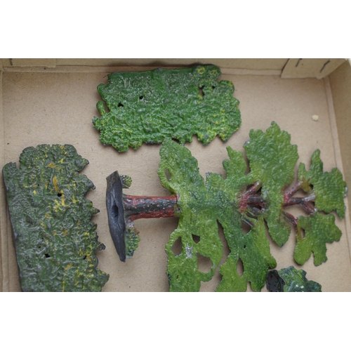 54 - A collection of pre-war Britains hollow cast lead trees and hedges. (Qty)