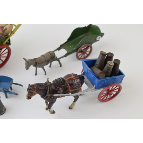 56 - A collection of pre-war Britains hollow cast 'Civilian' lead figures to include Tumbrel Cart, Meccan... 