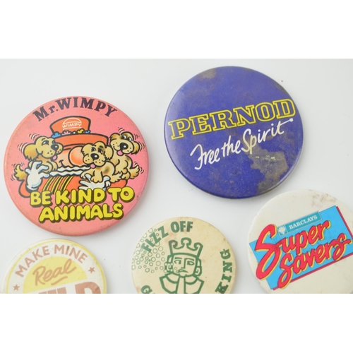 59 - A collection of vintage pin badges to include 'Ringwood Brewery', 'Greene King', 'Mr Wimpy', 'Post O... 