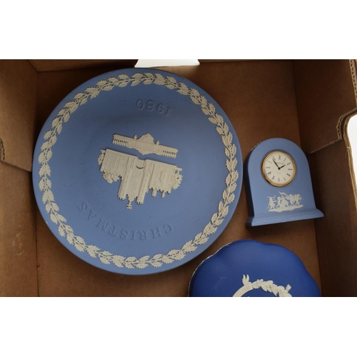 60 - A collection of Wedgwood Jasperware items to include a clock and an otter vase together with other J... 