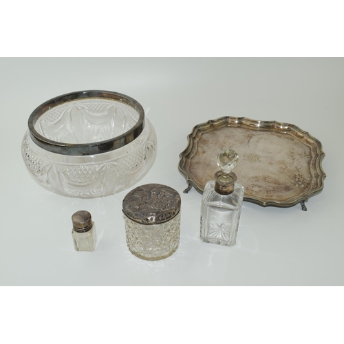 64 - A quantity of silver and silver-plated items to include two silver topped bottes and a silver topped... 