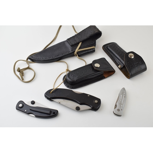 67 - A collection of leather knife belt pouches and sheaths together with three Marksman knives. (Qty)