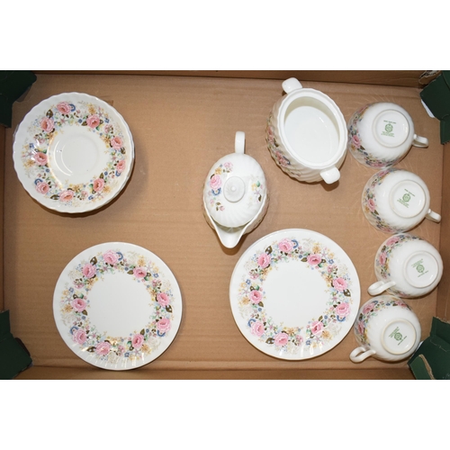 7 - Minton part tea service in the 'Rose Garland' pattern to include four cups four saucers and five sid... 